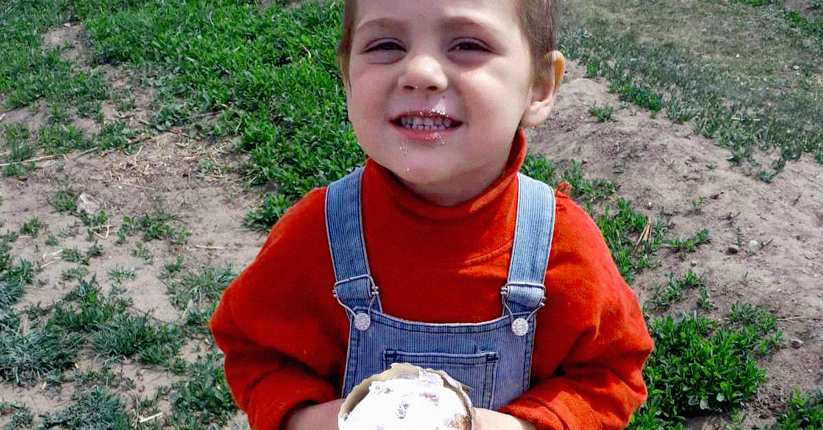 Mihai happy with a sweet treat