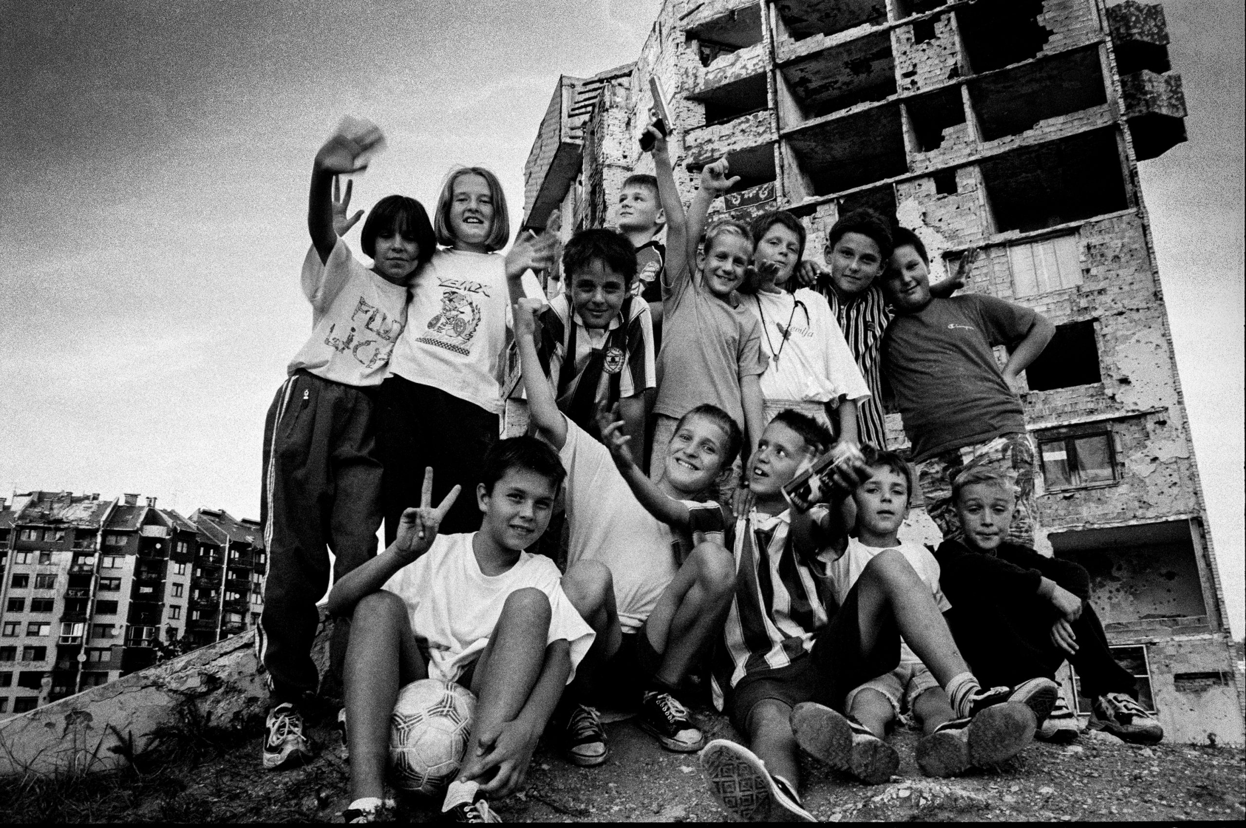 Children play among ruins