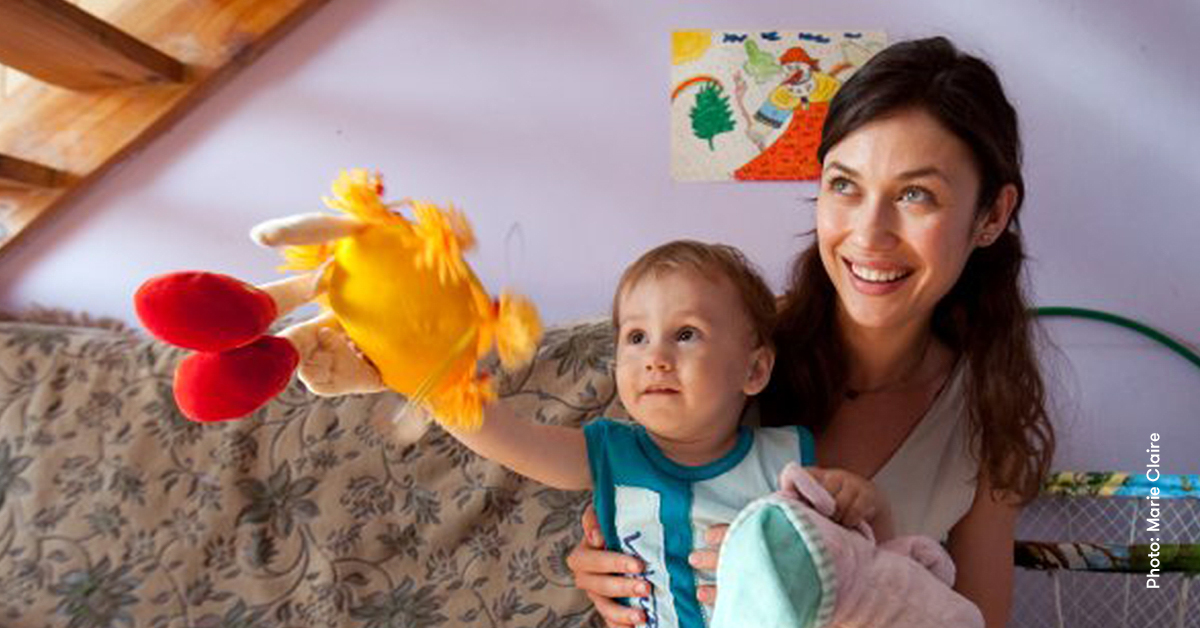 Olga Kurylenko visiting our work in Ukraine in 2010 © Marie Claire