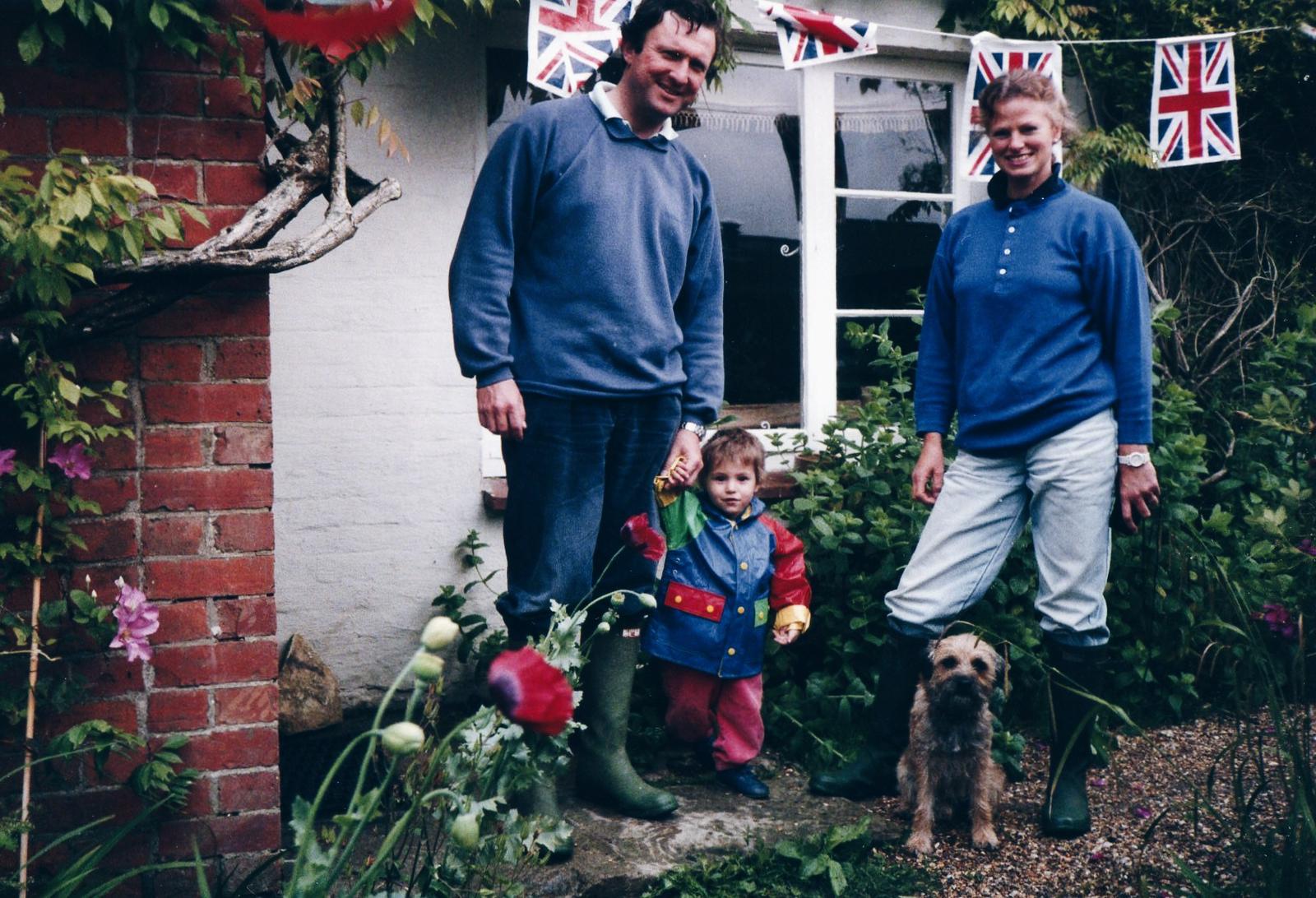 Alexandra Smart with her parents and a dog