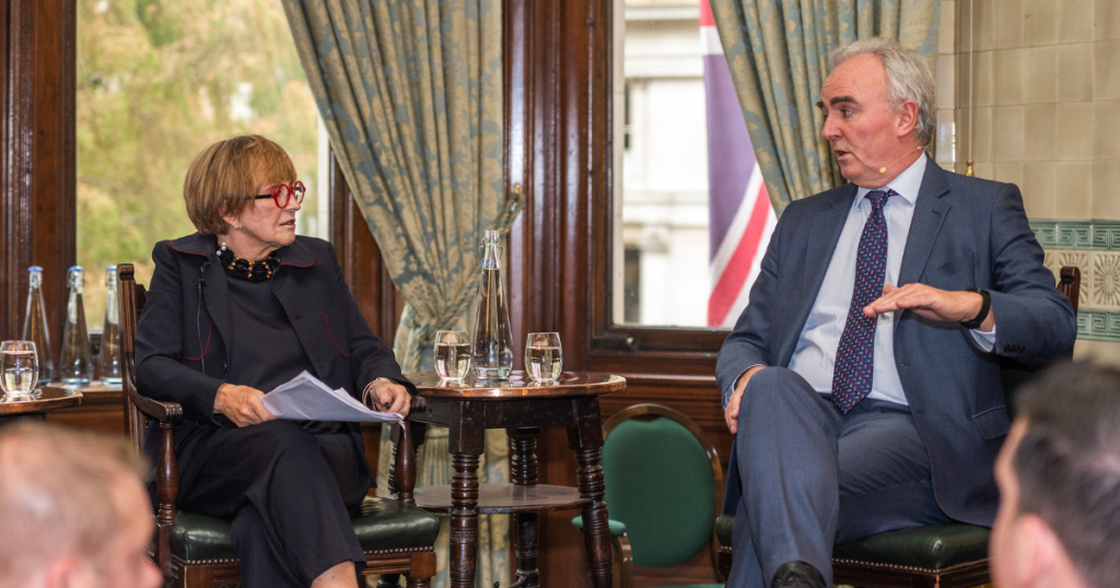 Anne Robinson questioning James Mates on stage at Swapping Seats